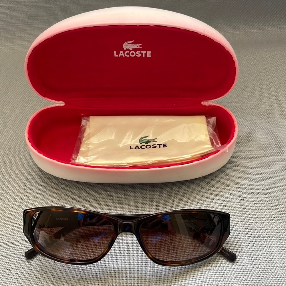 Lacoste tortoise sunglasses.  Small frame in hard case.